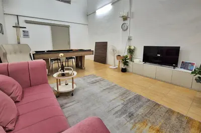 a living room with a couch and a pool table at Townhouse at Yaek Lam Sali station for 6 pax in Ban Bang Toei (1)