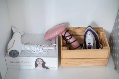 a wooden box with a bunch of shoes in it at 2 BR Suite at BTS NANA Sukhumvit 11 Floor 15 Pool not permitted in Bangkok