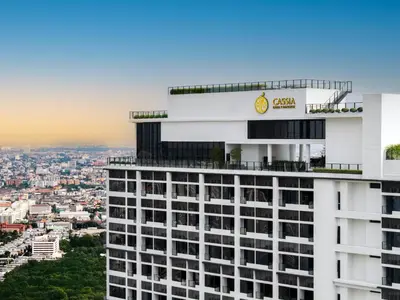 a view of a building with a sign on it at Cassia Rama 9 Bangkok, part of Banyan Group in Bangkok