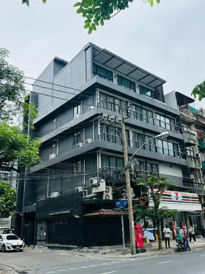 a tall building on the corner of a street at New Ekamai Thonglor Luxury Home near 711, BTS, Mall in Khlong Toei