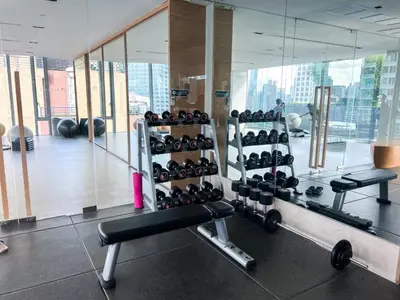 a gym with a bunch of equipment in a room at Extravagant Apt 65 sqm 1BR - Ultra Fast Wifi - Silom in Bangkok