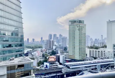 a view of a city with tall buildings at Luxury Modern 2BR 145 sqm - BTS Asok - Ultra Fast WiFi in Bangkok