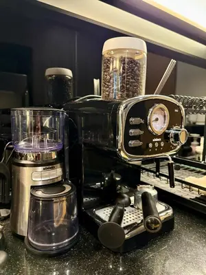 a toaster sitting on top of a kitchen counter at Cozy Spacious 1BR 3pax GardenView, 700m BTS ThongLo, Samitivej, SKV49, Fast wifi in Bangkok