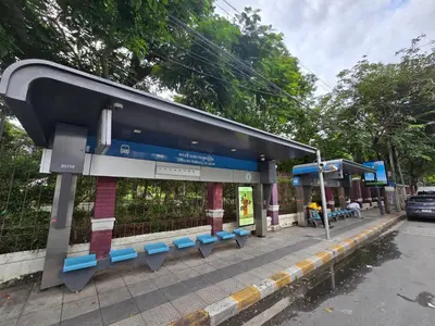 a bus stop with blue benches at at Twenty-one BKK House in Bang Kapi