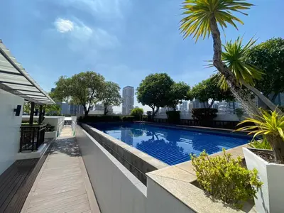 a swimming pool on the roof of a building at Contemporary 53 SQM - BTS Thong Lo - Ultra Fast WiFi in Bangkok