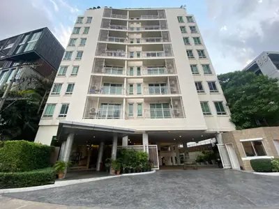 a tall white building with a lot of windows at Contemporary 53 SQM - BTS Thong Lo - Ultra Fast WiFi in Bangkok