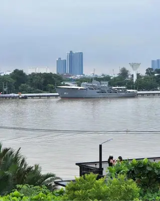 a large boat is docked in the water at Hiddenwoods in Bang Chak