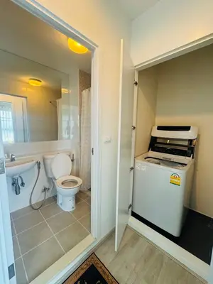 a small bathroom with a toilet and a sink at Minimal 2 BR next to IKEA, Central Westgate Bangyai in Ban Bang Krabu