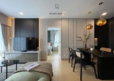 a living room with a kitchen and a dining room at Luxury room in Ban Khlong Bang Chak