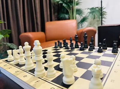 a chess board with chess pieces on a table at 7 Beds Villa Emquartier BtsThonglor Phrom phong in Bangkok