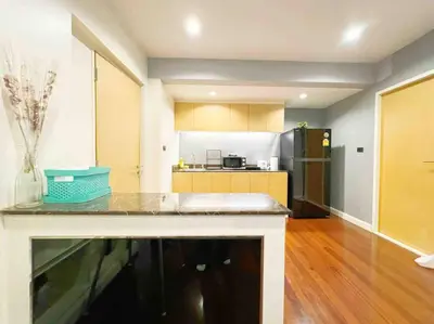 a kitchen with a counter top and a refrigerator at 5BRHouse City centre Silom 3min to BTS Saint Louis in Bangkok