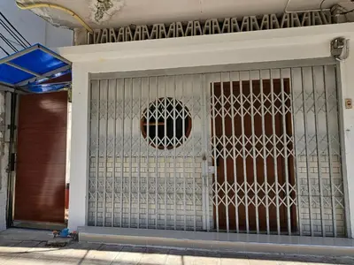a gate on the side of a building at NAN Square in Pratunam