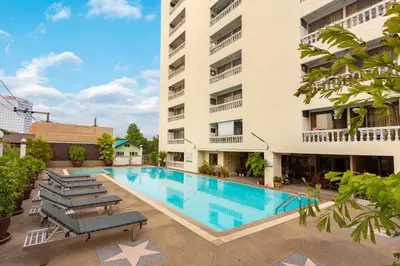 a swimming pool in the middle of a building at Omni Suites 1Bed #702A in Bangkok
