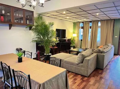 a living room with a couch and a table at 5BR House BTSNana Nanaplaza City center MBK Center world in Bangkok
