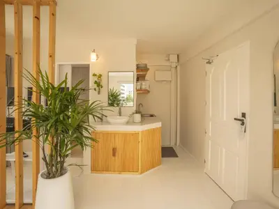 a bathroom with a sink and a mirror at Cozy studio room - 2 guests in the heart of Silom - 6B in Bang Rak