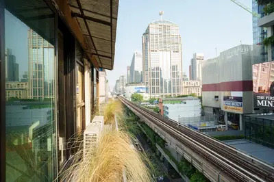 a view of a city from a train station at ZAYN Phrom Phong Hotel in Bangkok