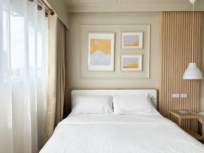 a bedroom with a white bed and a window at ห้องพักเมืองทองธานี Happiness sleep C4 in Ban Bang Phang