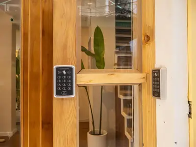 a door with a remote control attached to it at Cozy studio for 3 guests in the heart of Silom - 3B in Bang Rak