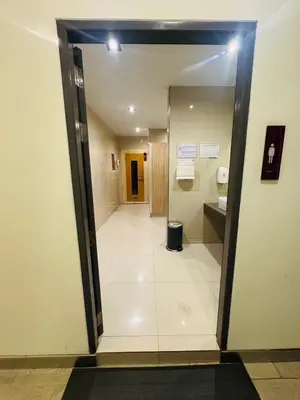 an open door to a bathroom in a building at 1 Bedroom Next to IKEA,Central Westgate46 in Ban Bang Krabu