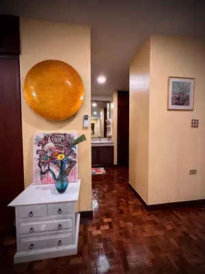 a room with a white dresser with a vase on it at Newly-renovated Modern Private Thai Villa with Swimming Pool in Ban Khlong Samrong