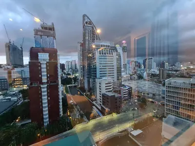 a view of a city skyline at night at The Address Chidlom 41sqm Studio 650m BTS Chit Lom in Bangkok