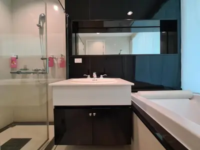 a bathroom with a sink and a mirror at The Address Chidlom 41sqm Studio 650m BTS Chit Lom in Bangkok