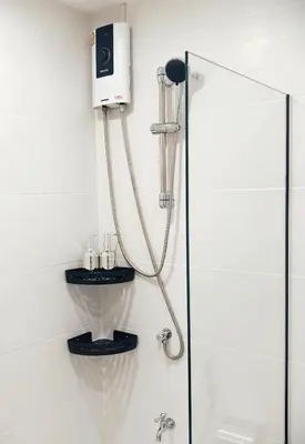 a shower in a bathroom with a shower at Fivehouse Silom1 - City heart - Silom -BTS MRT 2min - lumpini park - bnh in Bangkok