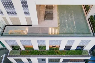 an overhead view of a house with a swimming pool at Pet Friendly Modern Nest Asoke in Bangkok