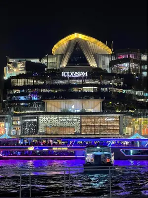 a building at night with lights in front of it at Riverside room with best view in heart of BKK in Godown