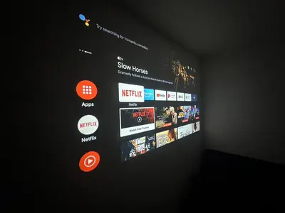 a wall with a bunch of tv screens on it at The White Den Chatuchak in Bang O