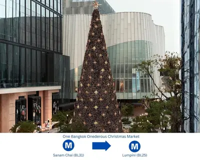 a christmas tree in front of a building at Seen Hostel Bangkok The Riverwalk in Bangkok