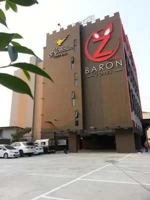 a large building with a zebra hotel sign on it at Baron Zotel Bangkok SHA PLUS in Bangkok