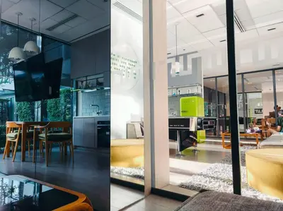 two views of a kitchen and a living room at Close to onnut bts condo in Bangkok