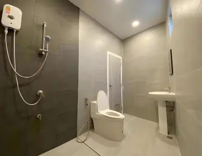 a bathroom with a toilet and a sink at XX Hidden Dragon ChinaTown MRT Wat Mangkon Station in Samphanthawong