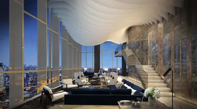 a living room with a view of a city at Brand New Condo in Bangkok
