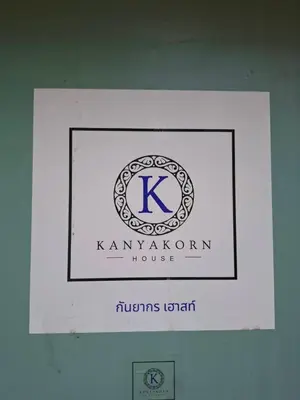 a sign for a kavanavan house on a wall at Kanyakorn House Near Khao San in Bangkok