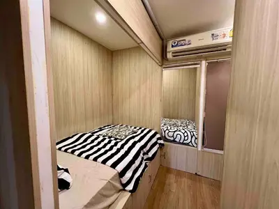 a small room with two beds in it at Comfy Crib Hostel 2 in Bangkok