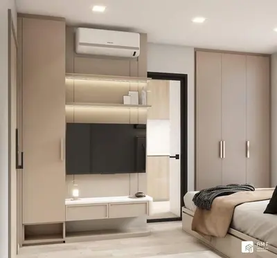 a bedroom with a flat screen tv and a bed at Modern room with Pool and Gym in the city center just 600m from Subway station! in Bangkok