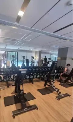 a gym with a lot of chairs and people in it at Luxury and cozy apartment in the City center in Bangkok