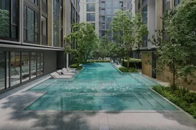 a swimming pool in the middle of a building at Luxury and cozy apartment in the City center in Bangkok