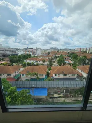a view of a city from a window at forest by Bangboon by Parisa in Sathani Wat Sing