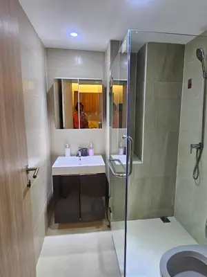 a bathroom with a sink and a shower at forest by Bangboon by Parisa in Sathani Wat Sing