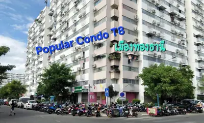 a group of motorcycles parked in front of a building at อิมแพ็ค เมืองทองธานี ห้องพักรายวัน Popular Condo T8 in Nonthaburi