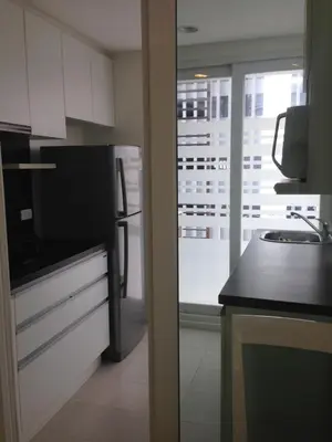 a kitchen with a refrigerator and a sink and a window at Condo near Iconsiam The Bangkok Sathorn-Taksin Corner Room in Godown