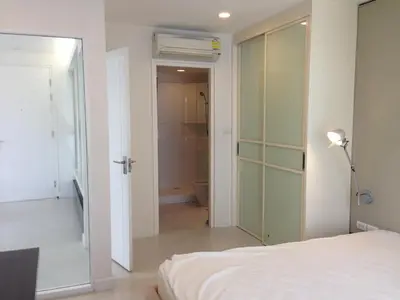 a bedroom with a bed and a bathroom at Condo near Iconsiam The Bangkok Sathorn-Taksin Corner Room in Godown