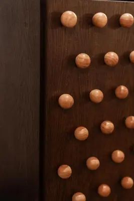 a wooden board with nuts on it at Blu Dock Restel Bangkok in Bangkok