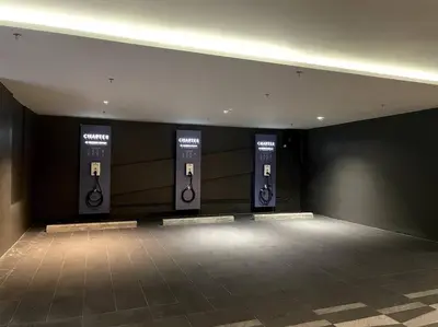 a room with three pay phones on a wall at Luxurious River View chao phraya river in Bangkok