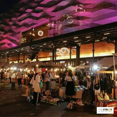 a crowd of people at a market at night at Cozy 1 Bedroom Apartment Close by Ratchada in Bangkok
