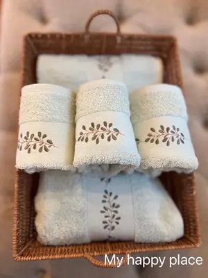 a basket filled with towels on top at My Happy Place in Nonthaburi