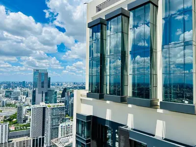 a view of the city from the top of a skyscraper at The Address Siam Luxury Two Bedrooms in Bangkok